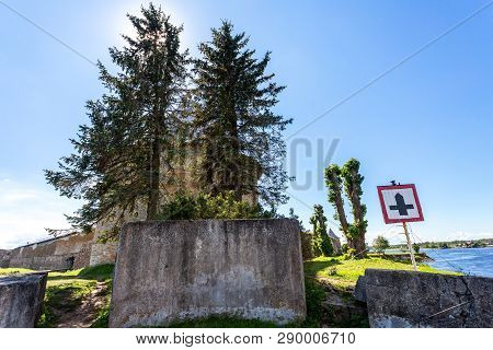 Medieval Oreshek Fortress On The Orechovyi Island In Shlisselburg, Russia. Сoastline With Trees And 