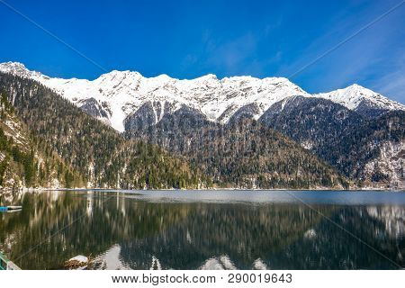 Beautiful View Of The Mountains Covered With Forest And The Lake In The Caucasus In Abkhazia