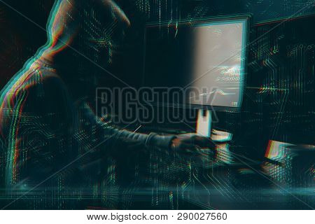 Hacker Using Computer