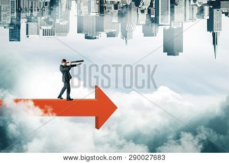 Businessman Looking Into The Distance With Binoculars On Red Arrow On Abstract Sky Background With C