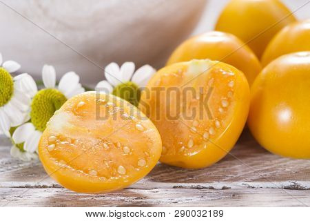 Fruit Of Cape Gooseberry, Uvilla On Wooden Background