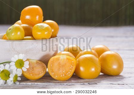 Fruit Of Uchuva, Uvilla, Aguaymanto On The Table - Physalis Peruviana