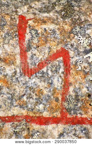 Close Up Of The Scandinavian Rune Sol From An Ancient Runestone.