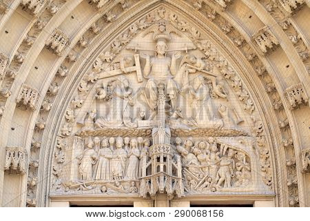 WURZBURG, GERMANY - JULY O4, 2018: The tympanum shows the Last Judgment, portal of the Marienkapelle in Wurzburg, Bavaria, Germany