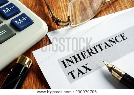 Inheritance Tax Application Form, Calculator And Pen.