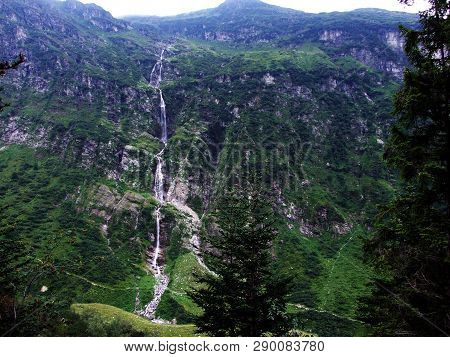 Waterfall Lammerbachfall Or Wasserfall Lammerbachfälle, Lammerbach Stream In The Alpine Valley Of Ma
