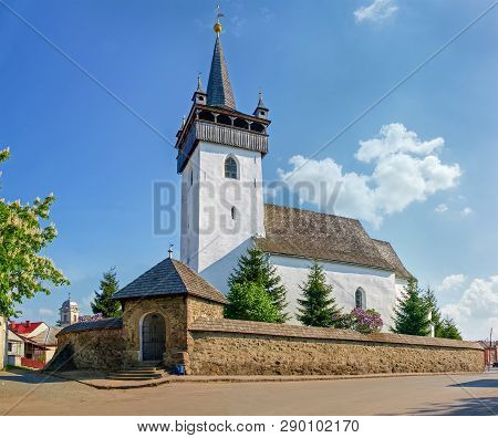 Stone Gothic Reformed Fortress Church 13th Century With Bell Tower, Wooden Shingle Roof And Defensiv