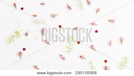 Flowers Composition. Frame Made Of Dried Rose Flowers On White Background.