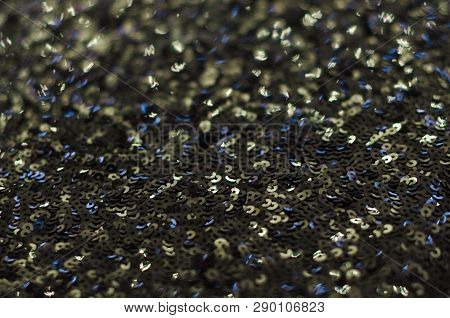 Texture Background Of Black Sparkles, Shining Evening Fabric. Pieces Of Cloth With Silver Sequins. T