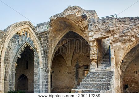 Ruins Of The Abbey Of Bellapais In The Northern Cyprus. Bellapais Abbey Is The Ruin Of A Monastery B