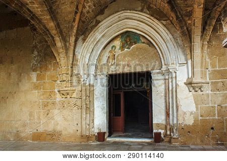 Entance Of The Church Of Abbey Of Bellapais In The Northern Cyprus. Bellapais Abbey Is The Ruin Of A