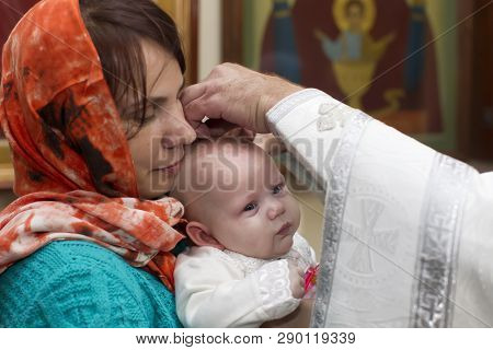 Belarus, The City Of Gomel, Prudkovskaya Church. November 4, 2018. The Rite Of Baptism. Priest Bapti