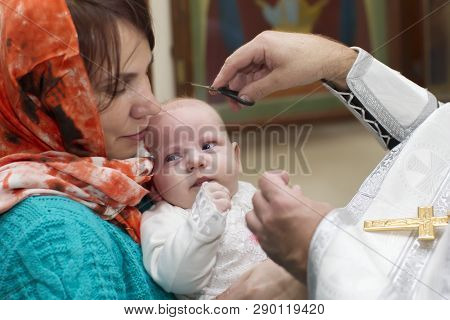 Belarus, The City Of Gomel, Prudkovskaya Church. November 4, 2018. The Rite Of Baptism. Priest Bapti