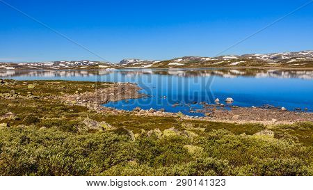 Hardangervidda Mountain Plateau Landscape. National Tourist Hardangervidda Route. Norway In Summer.