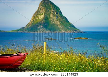 Seascape, Sea Coast With Red Canoe Kayak On Shore, Resort Bleik Andoya Norway. Vesteralen Archipelag