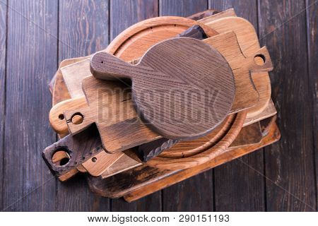 Food Background. Cutting Board On Dark Wooden Table. Copy Space.