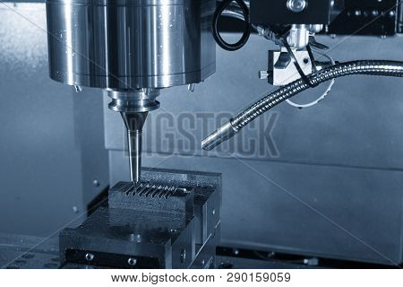 The  Cnc Milling Machine Cutting The Mould Part With The Solid Ball End Mill Tool.the Hi-technology 