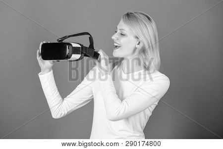 Young Woman Using A Virtual Reality Headset With Conceptual Network Lines. Portrait Of Young Woman W