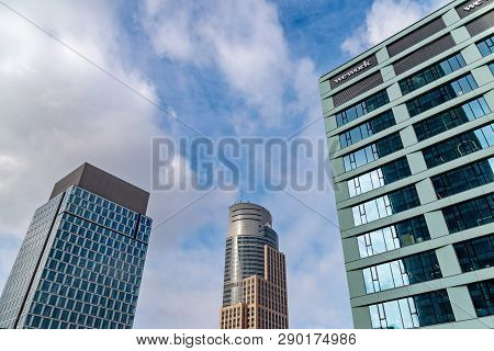 Warsaw Poland. February 18, 2019. Glass Skyscrapers Of Irregular Shape. Bottom View. Abstract Archit