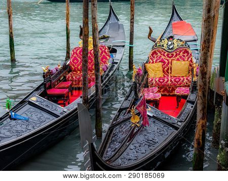 Venice / Italy 19 February 2019 :gondols ,the Symbol Of Venice , Parked In The Canal