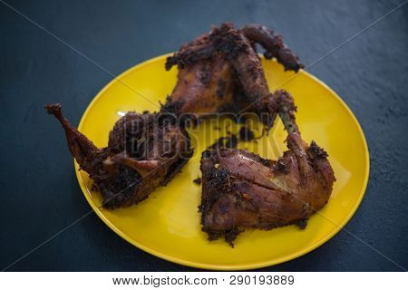 Traditional Malay style fried chicken with spices.