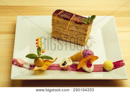 Dessert - Cake With Chocoltae Icing And Fresh Mint