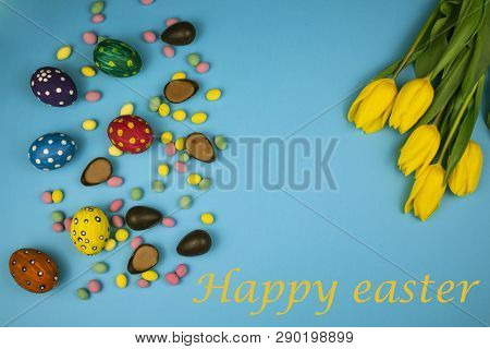 Easter Eggs. Happy Easter Card. Multi-colored Easter Eggs. Easter. Easter Eggs On A White Wooden Bac
