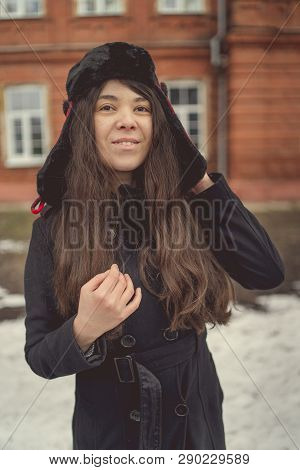 Portrait Of A City Girl In A Blue Jacket. Girl Walking In The Fresh Air