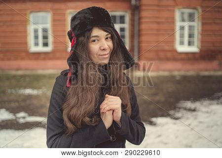Portrait Of A City Girl In A Blue Jacket. Girl Walking In The Fresh Air