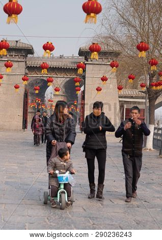 Luoyang, Henan/china- January 19, 2019: The Unspecific People Walking At The Longmen Grottoes.