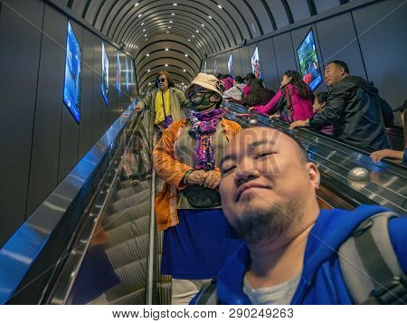Zhangjiajie/china - 15 October 2018:unacquainted Tourists In Tianmen Mountain Tunnels Escalator To H