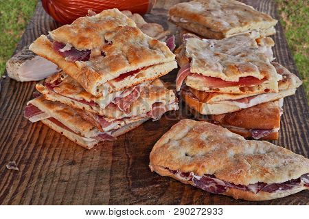 Italian Food: Traditional Flat Bread Called Focaccia Or Schiacciata, A Flat Oven-baked Bread Product