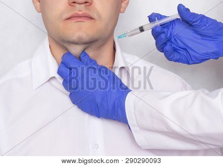 The Doctor Makes The Patient In A Double Chin Lipolitic Injection, Cosmetic And Plastic, Close-up