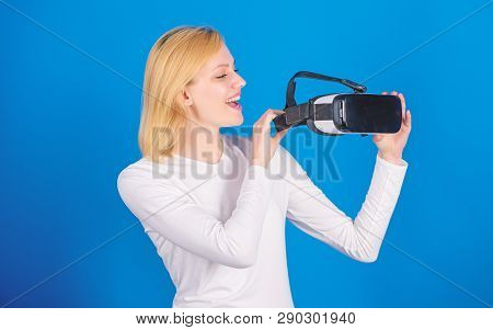 Young Woman Using A Virtual Reality Headset With Conceptual Network Lines. Portrait Of Young Woman W
