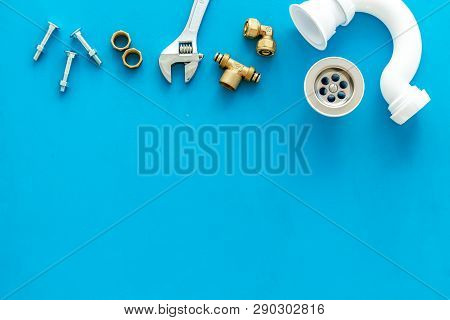 Professional Instruments For Plumber On Blue Background Top View Space For Text