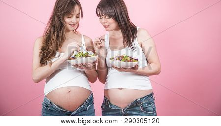Maternity Concept, Two Pregnant Woman Eating Fresh Salad