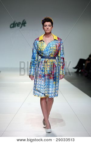 ZAGREB, CROATIA - NOVEMBER 25: Fashion model wears clothes made by Nino Bollag on 'Fashion Week Zagreb' show on November 25, 2011 in Zagreb, Croatia.