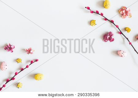 Easter Composition. Easter Eggs, Flowers On Pastel Gray Background. Flat Lay, Top View, Copy Space