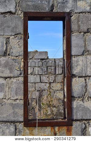 View Through Window Hole Of Brick Building Texture
