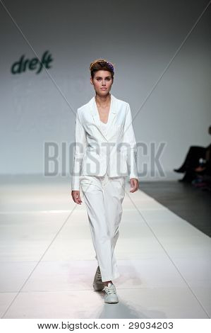 ZAGREB, CROATIA - NOVEMBER 25: Fashion model wears clothes made by Nino Bollag on 'Fashion Week Zagreb' show on November 25, 2011 in Zagreb, Croatia.