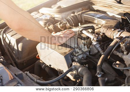 Faceless Man Touches Engine Of His Car, Has Some Problems, Can Not Drive Automobile, Needs New Spare