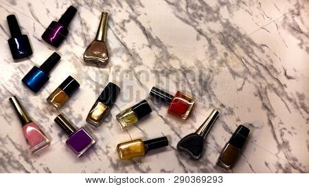 Scattered Nail Polish In The Beauty Salon. The Choice Of Color Nail Polish For Manicure Or Pedicure.