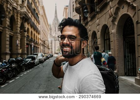 Traveler Male Looking On A Big Europe City, Travel And Active Lifestyle Concept.bearded Tourist Man 