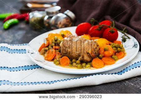 Beef meat stewed with potatoes-Traditional French cuisine Beef Bourguignon potatoes carrots in persillade