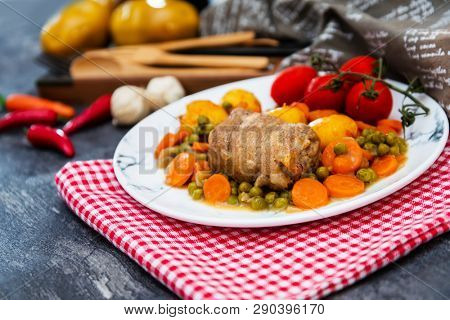 Beef meat stewed with potatoes-Traditional French cuisine Beef Bourguignon potatoes carrots in persillade