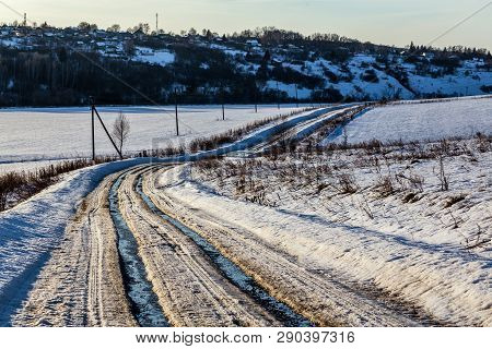 Rustic Road Track At Winter Thaw Daylight With Nobody