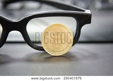 Bitcoin Cryptocurrency Concept.glasses And Desktop Keyboard At Background. Stock And Exchange Ocupat