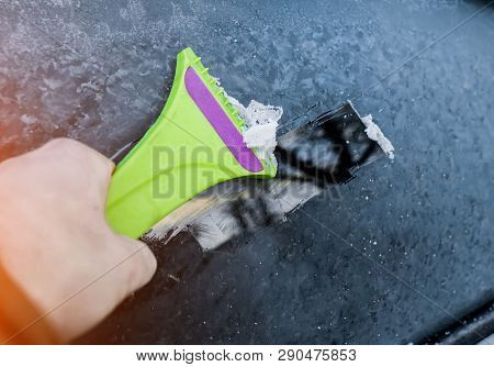 Cleaning Snow From Windshield, Scraping Ice, Winter Car Window Cleaning