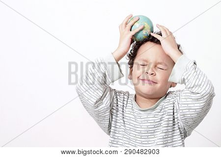 Boy Holding A Big Globe On His Head With White Background Stock Photo