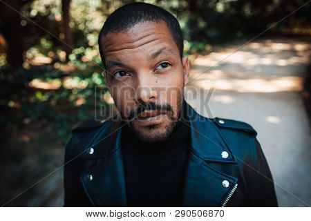 Confident Stylish African American Man Wearing Black Leather Jacket Outdoor. Street Wear Fashion Bla